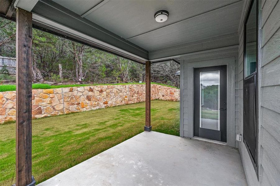 Exterior details and patio area of a home in , Granbury (Image 26).