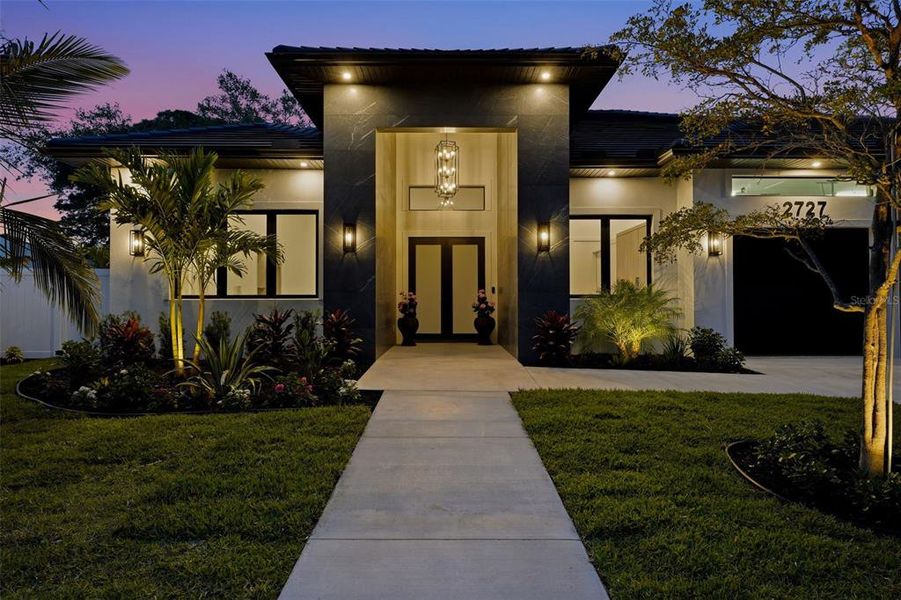 Front exterior of a new home in , Sarasota, FL, highlighting curb appeal (Image 28).