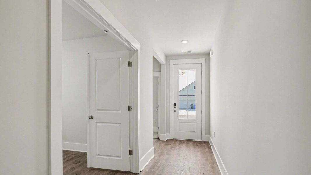 Representative unfurnished interior of a home built from the Danville by D.R. Horton in Chapman Village, Conway (Image 9).
