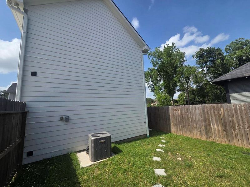 Exterior details and patio area of a home in , Houston (Image 9).