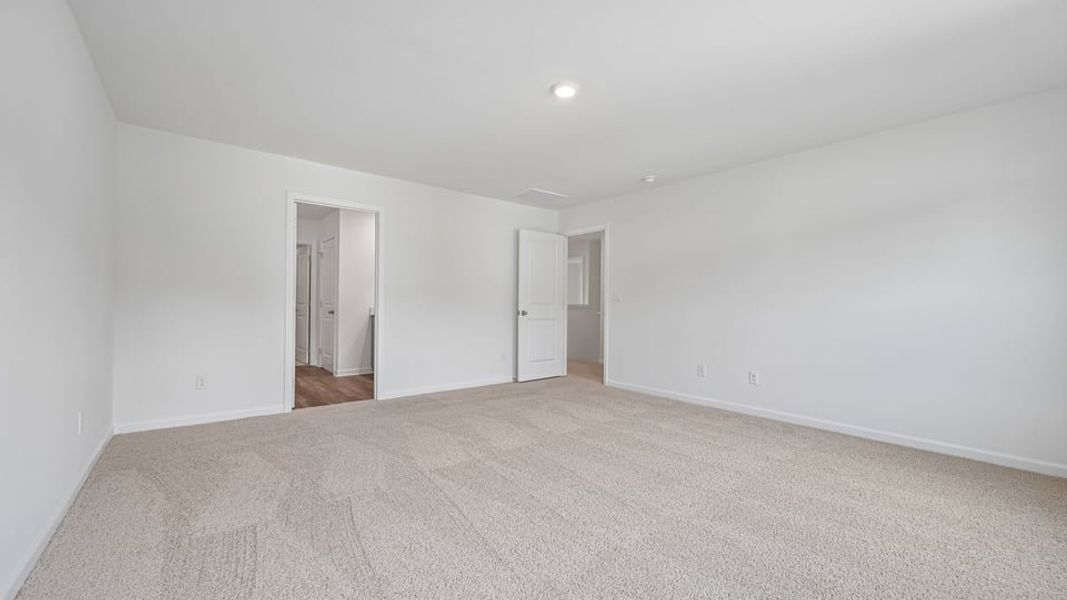 Spacious, unfurnished interior of a new home in Mangum Farms, Stem (Image 21).