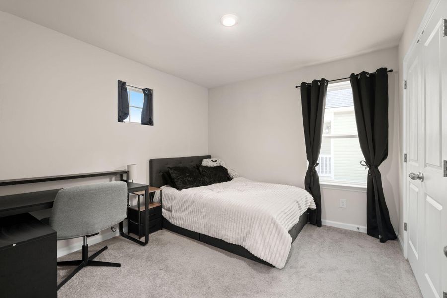 Furnished interior view inside a new home in Jasmine Point at Lakes of Cane Bay, Summerville (Image 18).