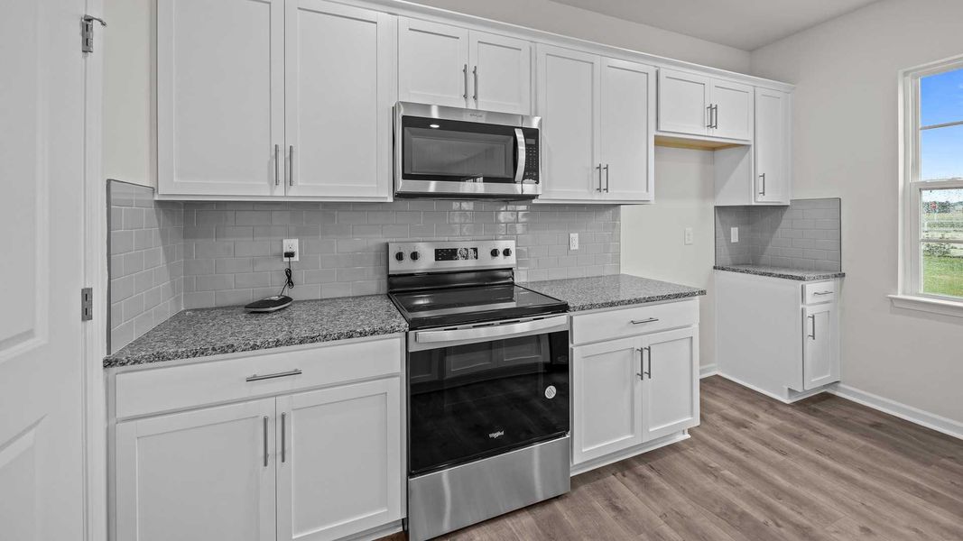 Furnished interior view inside a new home in Ridgewood Farms, Winterville (Image 6).