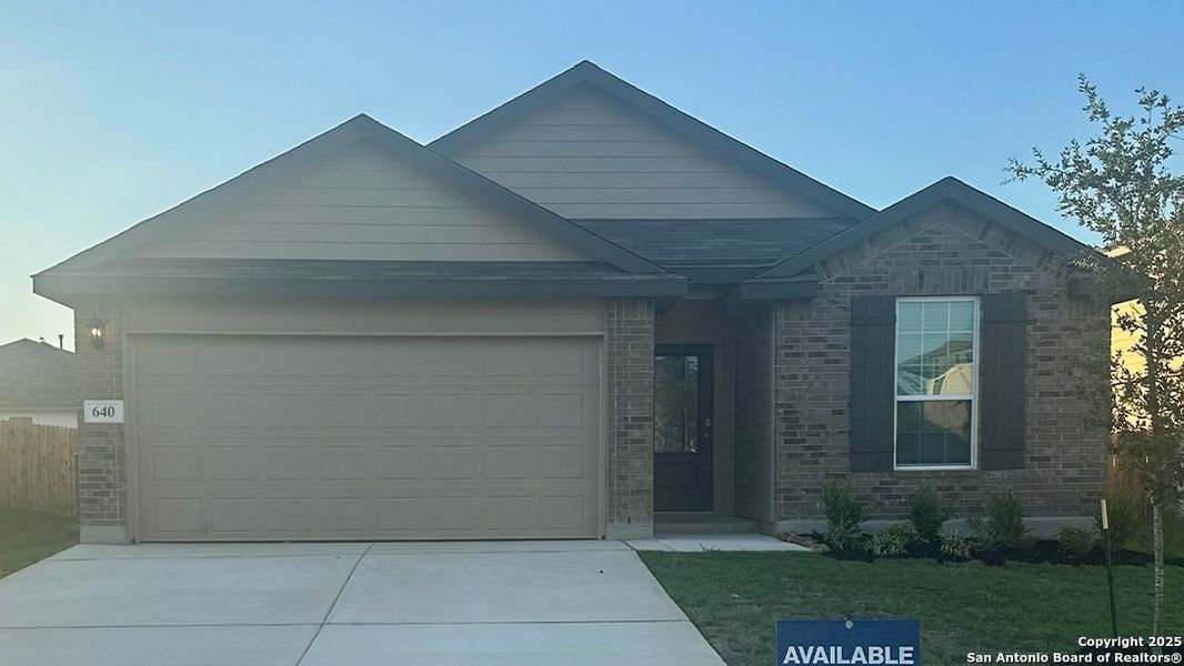 Front exterior of a new home in Steele Creek, Cibolo, TX, highlighting curb appeal (Image 12). Front exterior of a new home in Steele Creek, Cibolo, TX, highlighting curb appeal (Image 12).