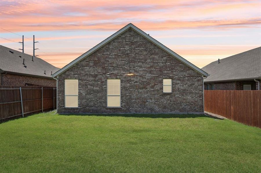 Front exterior of a new home in , Lavon, TX, highlighting curb appeal (Image 1). Front exterior of a new home in , Lavon, TX, highlighting curb appeal (Image 1).
