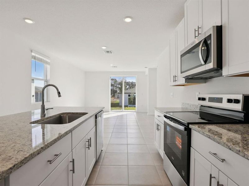 Furnished interior view inside a new home in Benton Hills - Premier Series, Brooksville (Image 3).