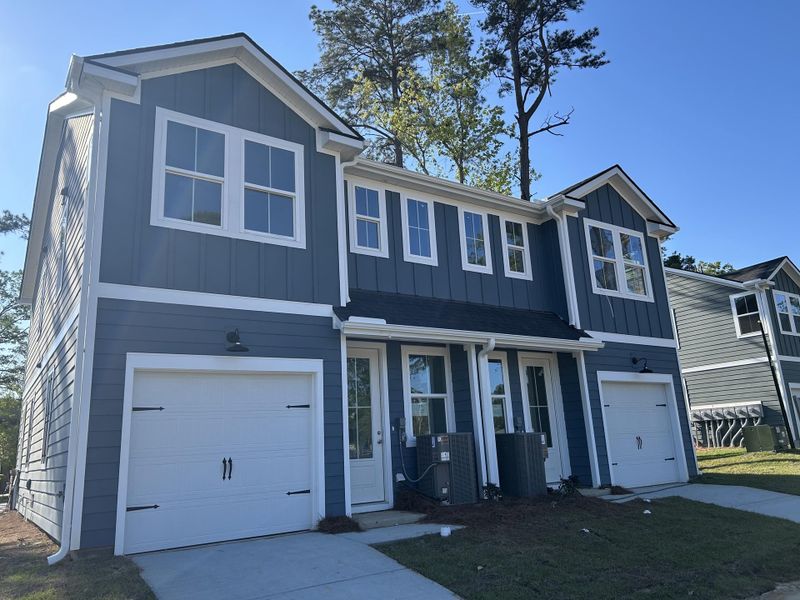 Front exterior of a new home in , Summerville, SC, highlighting curb appeal (Image 24).