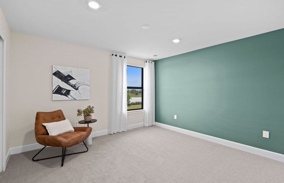 Fifth bedroom with large window located down stairs