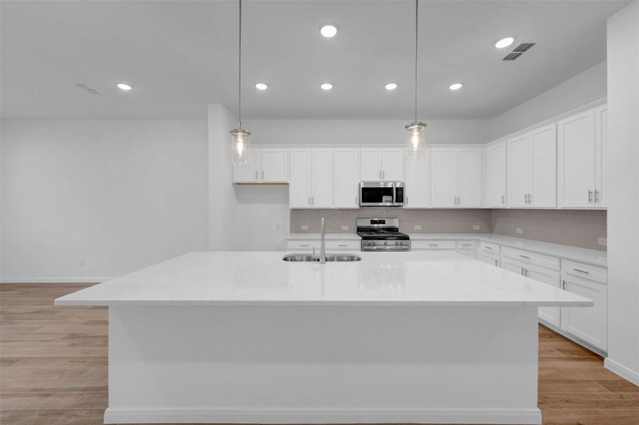 Furnished interior view inside a new home in Meridiana - Terrace Collection, Manvel (Image 3).