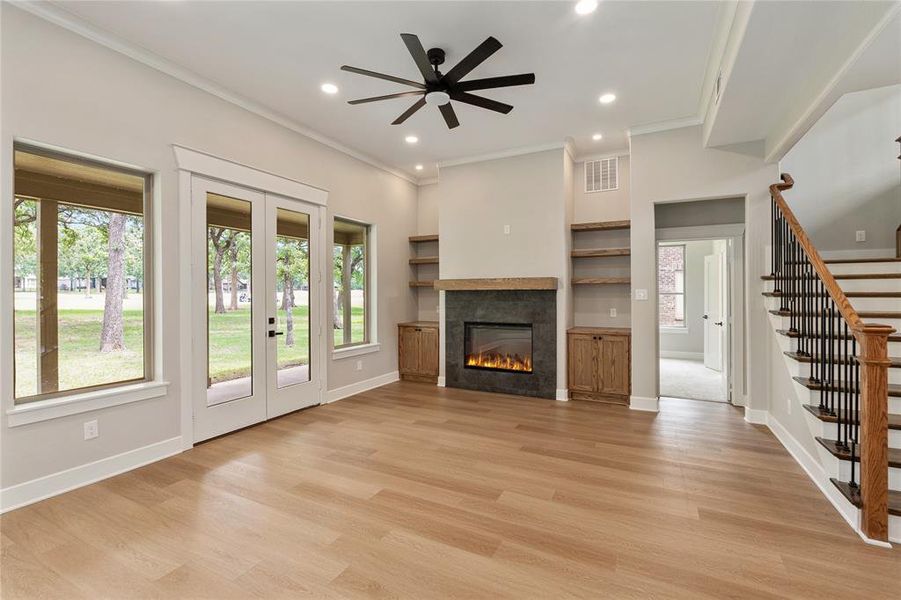 Living room with luxury laminate wood plank floors Living room with luxury laminate wood plank floors
