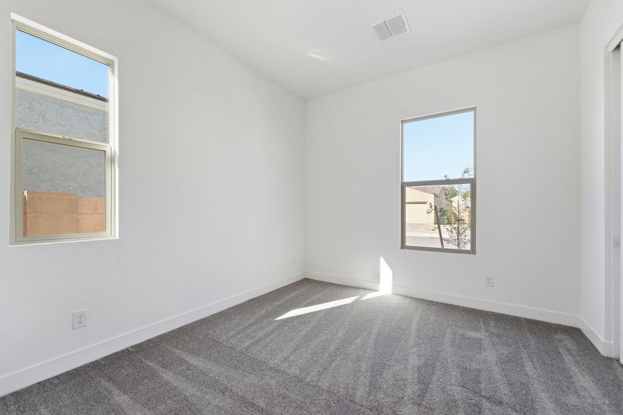Spacious, unfurnished interior of a new home in Combs Ranch, San Tan Valley (Image 31).