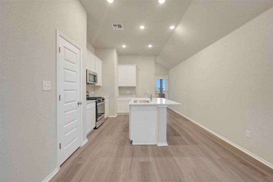 Furnished interior view inside a new home in Heritage, Dripping Springs (Image 9).
