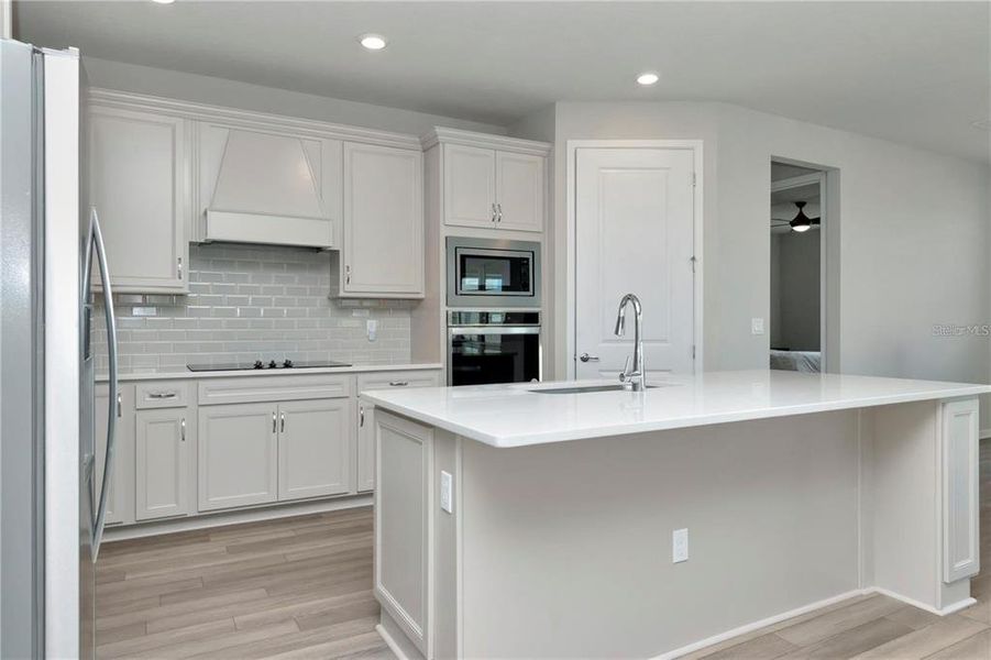 Furnished interior view inside a new home in Tohoqua Reserve, Kissimmee (Image 15).