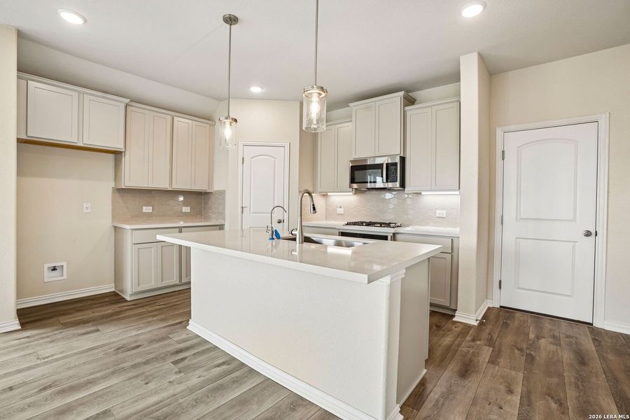 Furnished interior view inside a new home in Prairie Green, Converse (Image 6).