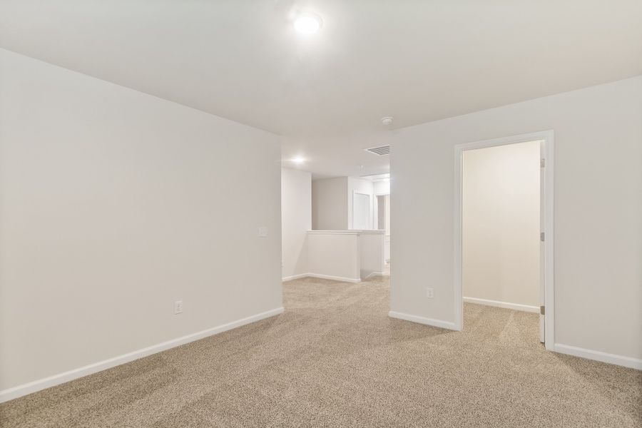 Spacious, unfurnished interior of a new home in The Grove, Florence (Image 50).