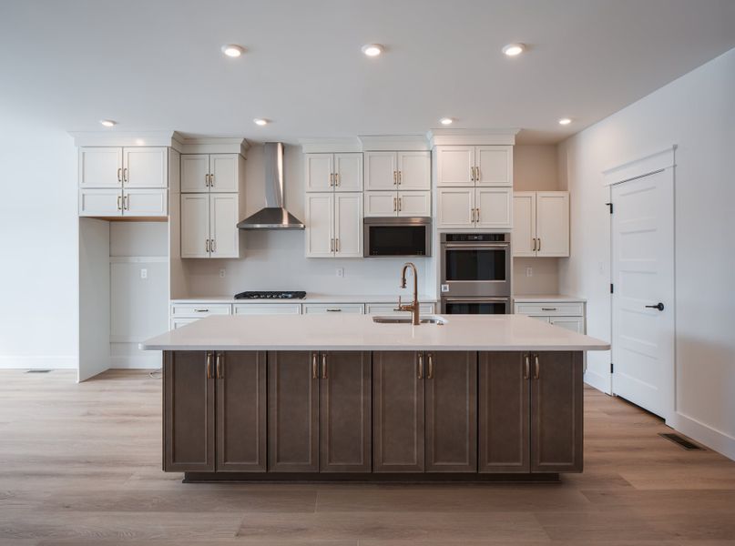 Representative furnished interior of a home built from the Woodford by Keystone Custom Homes in Lakestone Cove, Belmont (Image 4).