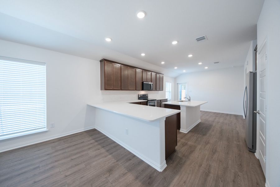 Furnished interior view inside a new home in Churchill, Anna (Image 6).