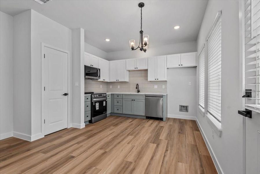 Another angle of the open-concept layout. Another angle of the open-concept layout.