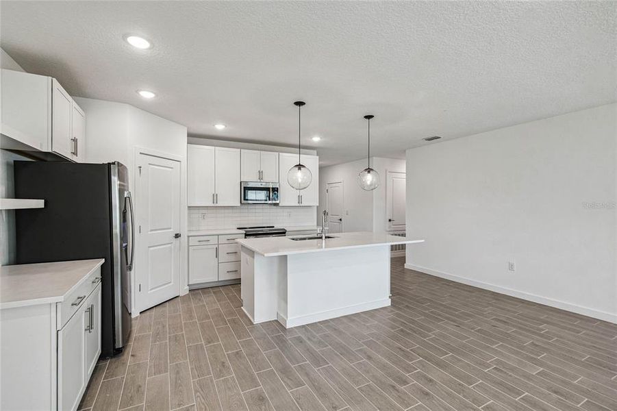 Furnished interior view inside a new home in Aspire at The Pines, Dunnellon (Image 4).