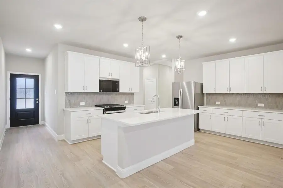 Furnished interior view inside a new home in Parks at Foster Crossing - Spring Series, Anna (Image 9).