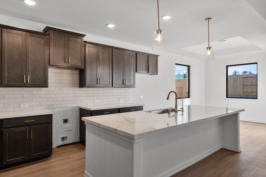 Kitchen. Sample product photo. Actual exterior and interior selections may vary by homesite. Photo may be virtually staged. Kitchen. Sample product photo. Actual exterior and interior selections may vary by homesite. Photo may be virtually staged.