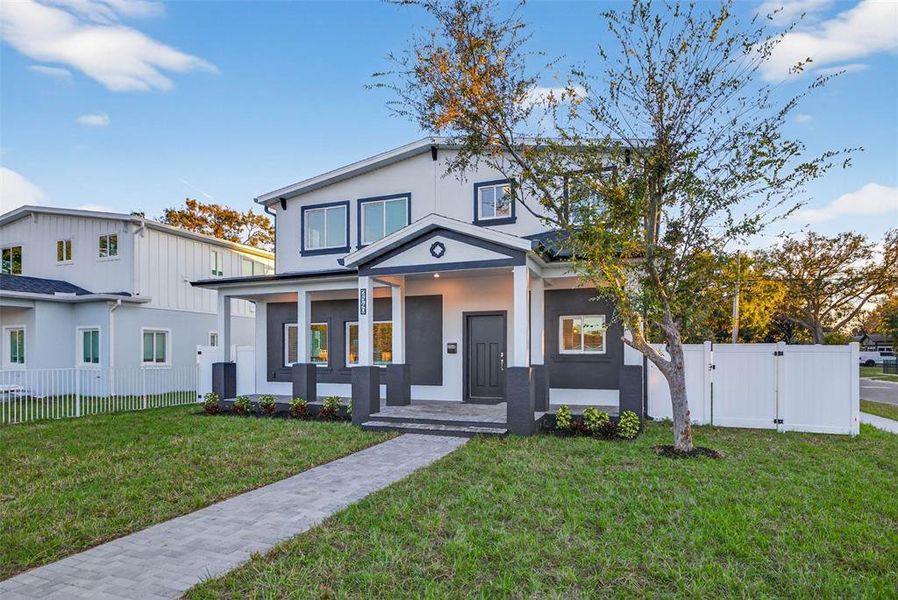 Front exterior of a new home in , St. Petersburg, FL, highlighting curb appeal (Image 29). Front exterior of a new home in , St. Petersburg, FL, highlighting curb appeal (Image 29).