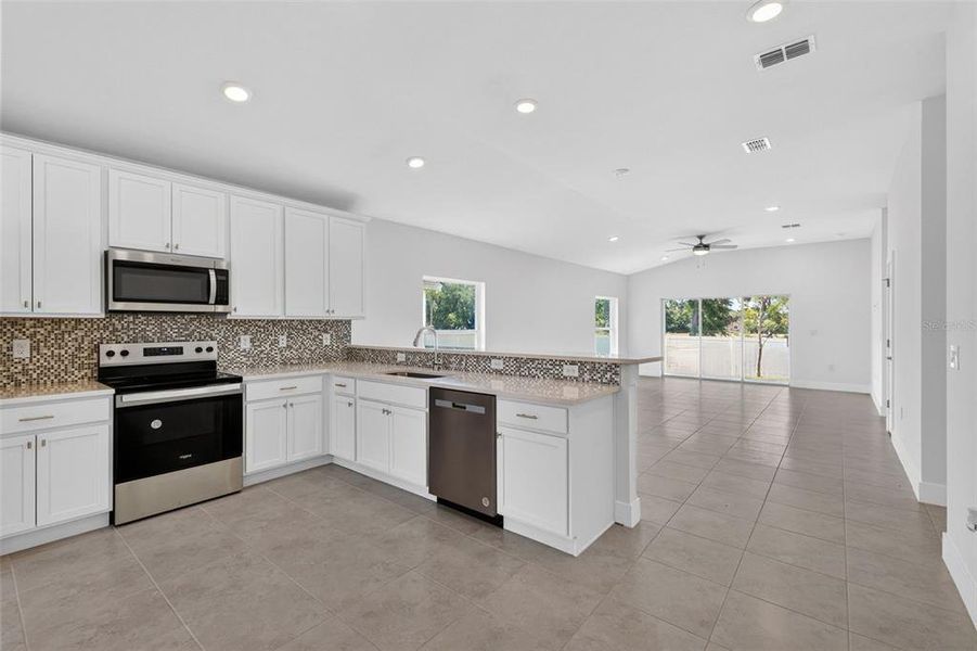 Furnished interior view inside a new home in , Port Charlotte (Image 6).