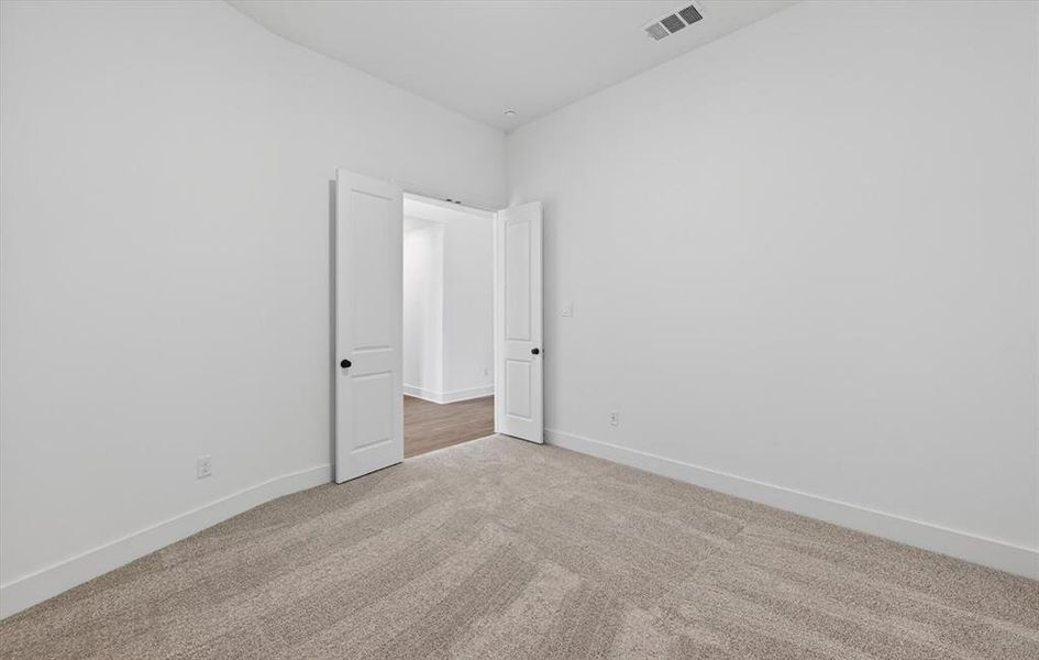 Spacious, unfurnished interior of a new home in Wellington, Haslet (Image 14).