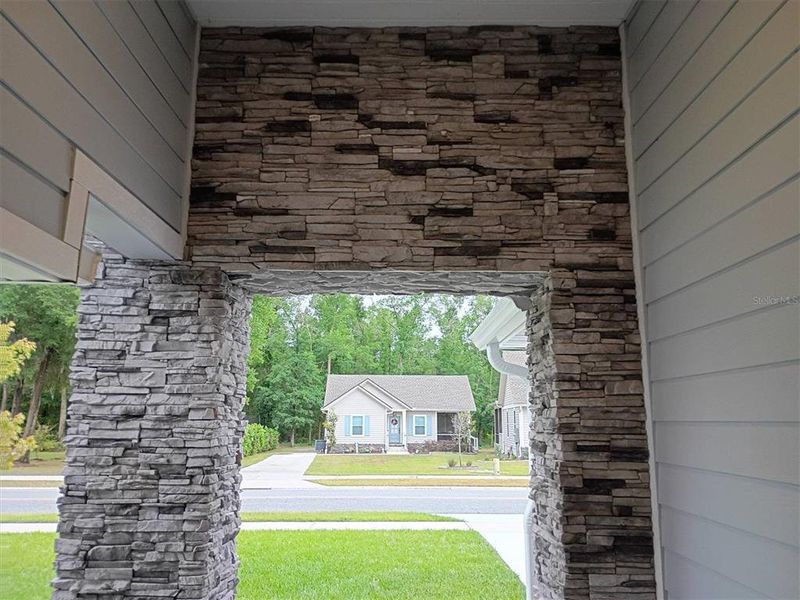 Exterior details and patio area of a home in , Lake City (Image 38).