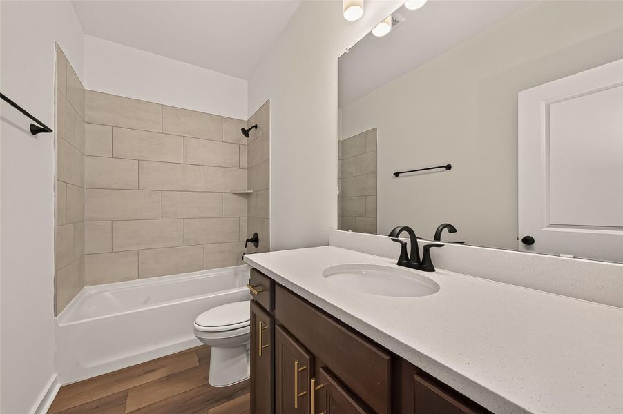 Furnished interior view inside a new home in Aldeana, Bonney (Image 7).