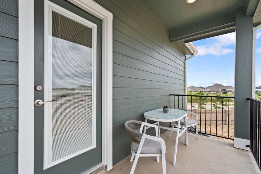 Exterior details and patio area of a home in Bridgeland, Cypress (Image 3).
