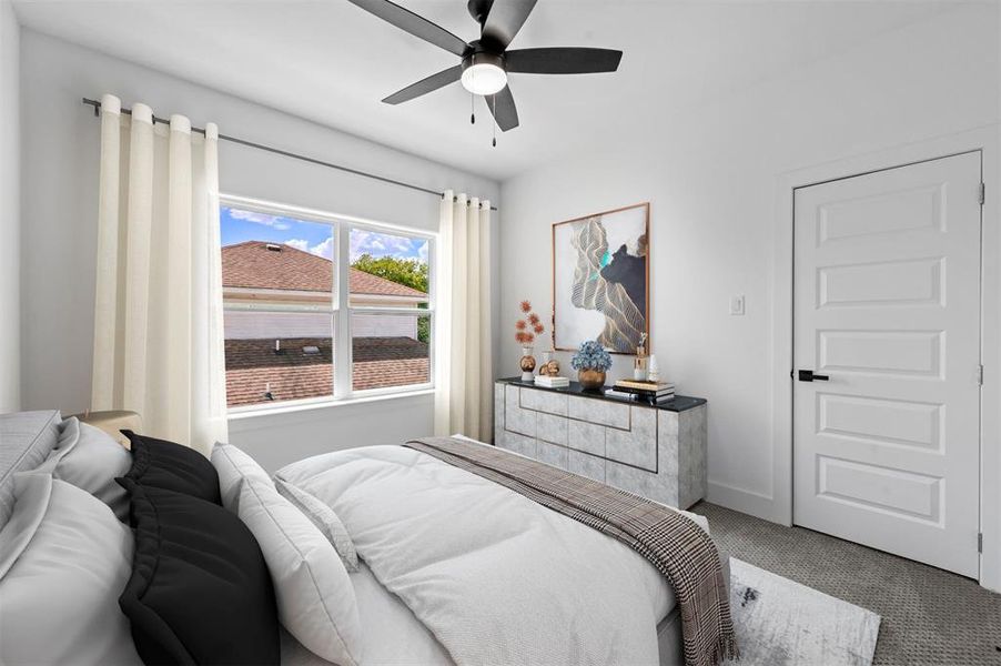 Bedroom featuring carpet flooring and ceiling fan