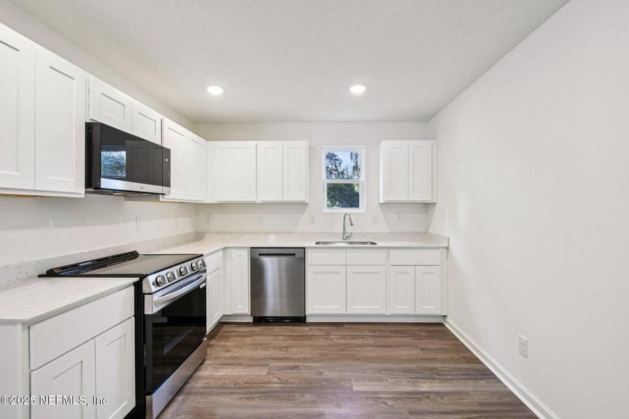 Furnished interior view inside a new home in Kings Landing, Jacksonville (Image 11).