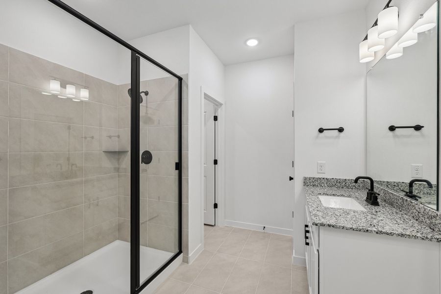 Representative furnished interior of a home built from the 4013 by Risewell Homes in Parkton Square, Kyle (Image 8).