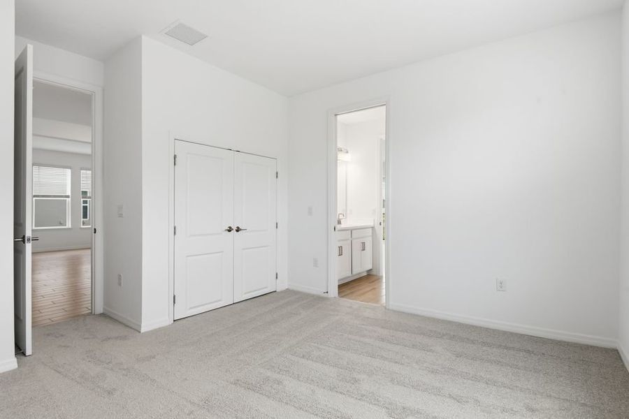 Representative unfurnished interior of a home built from the Barbados by Taylor Morrison in Ardisia Park, New Smyrna Beach (Image 41).