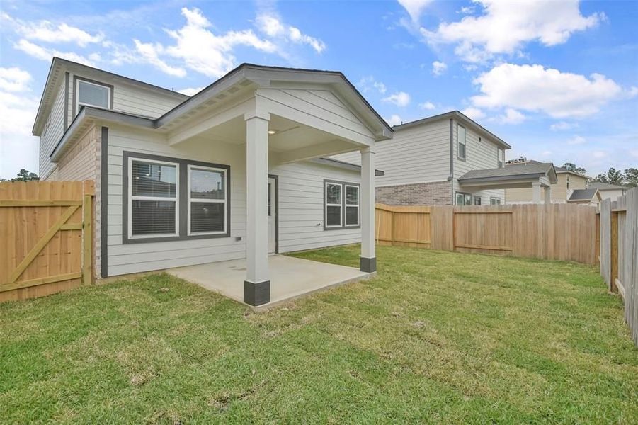 Front exterior of a new home in Lakes at Black Oak, Magnolia, TX, highlighting curb appeal (Image 74).