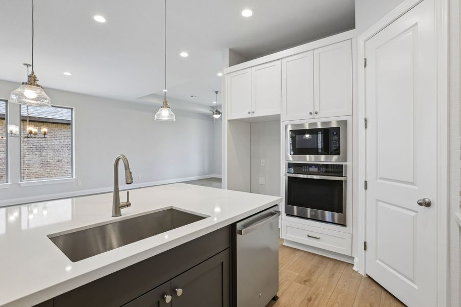 Furnished interior view inside a new home in 6 Creeks, Kyle (Image 6).