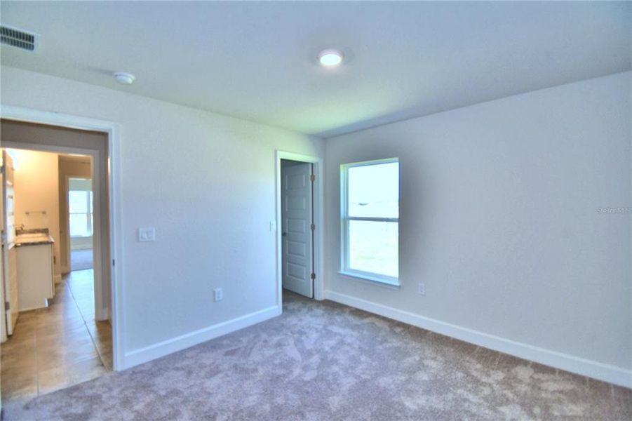 Spacious, unfurnished interior of a new home in Cadence Crossing, Auburndale (Image 32).