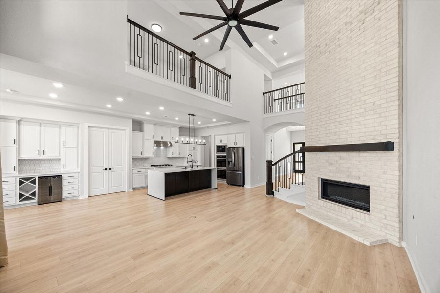 Floor ceiling tiles, near fireplace and family room