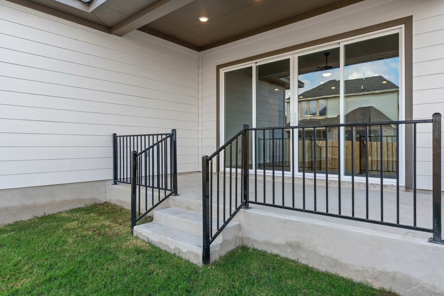 Exterior details and patio area of a home in Lariat, Liberty Hill (Image 31).