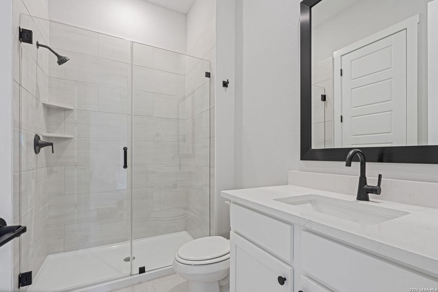 Furnished interior view inside a new home in Potranco West, Castroville (Image 5).