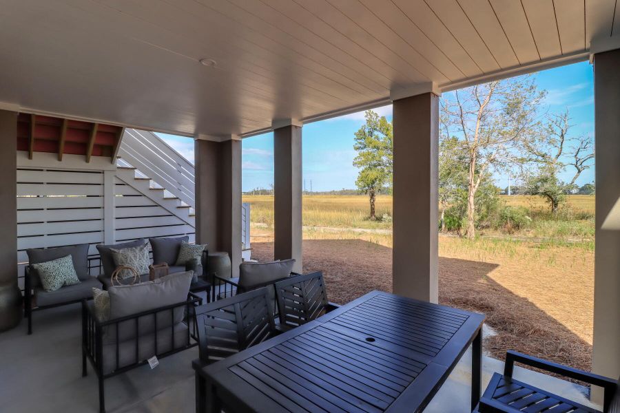 Exterior details and patio area of a home in The Preserve at Pennys Creek, Johns Island (Image 26).