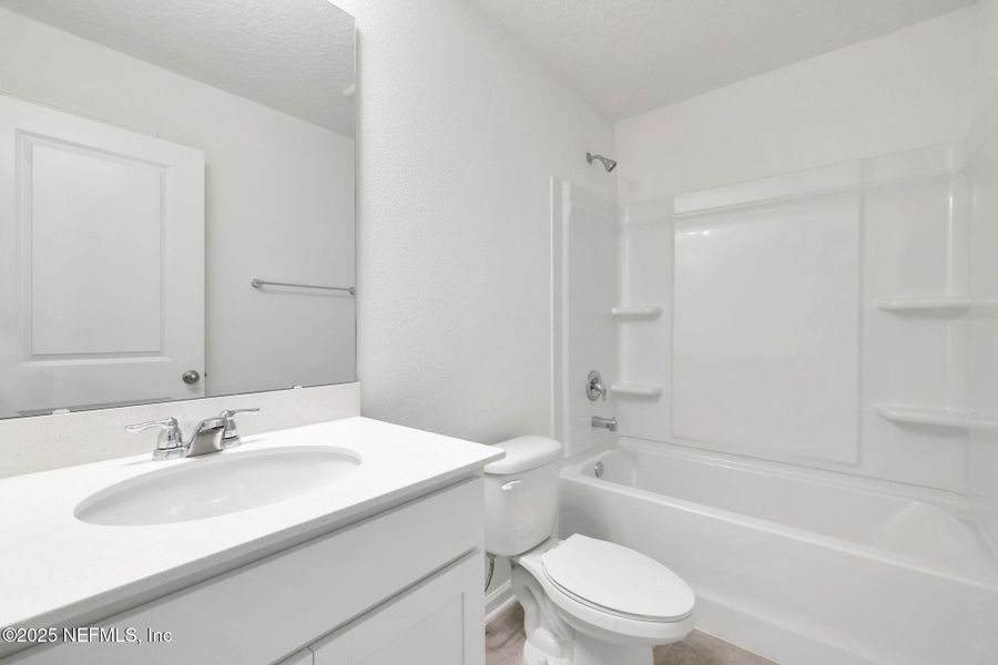 Furnished interior view inside a new home in Atlantis Pointe, Middleburg (Image 7).