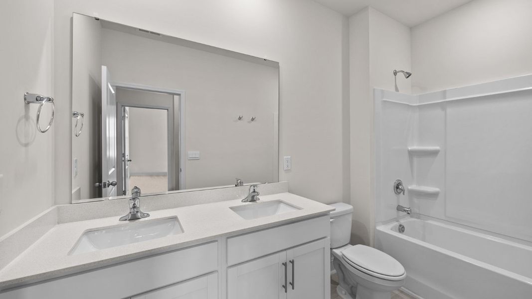 Furnished interior view inside a new home in Beaver Dam Crossing, Bailey (Image 10).