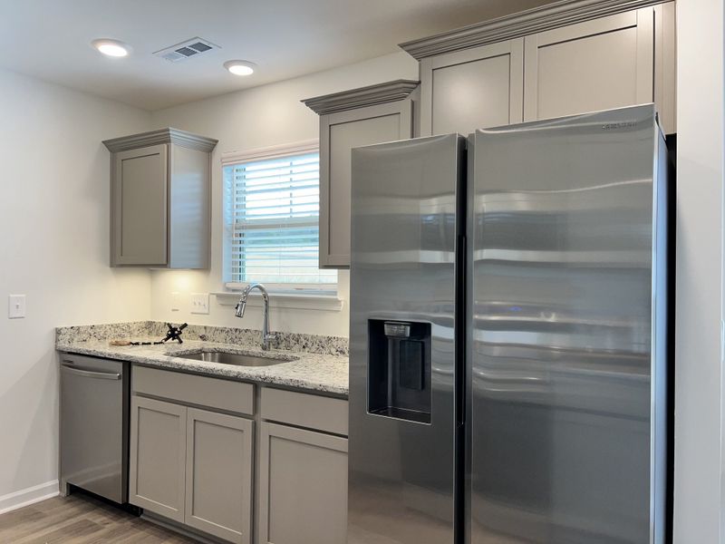 Furnished interior view inside a new home in Wheatfield, Shelbyville (Image 3). Furnished interior view inside a new home in Wheatfield, Shelbyville (Image 3).