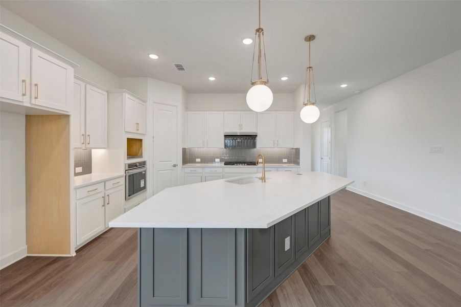 Furnished interior view inside a new home in Riceland - Enclave Row Collection, Mont Belvieu (Image 8).