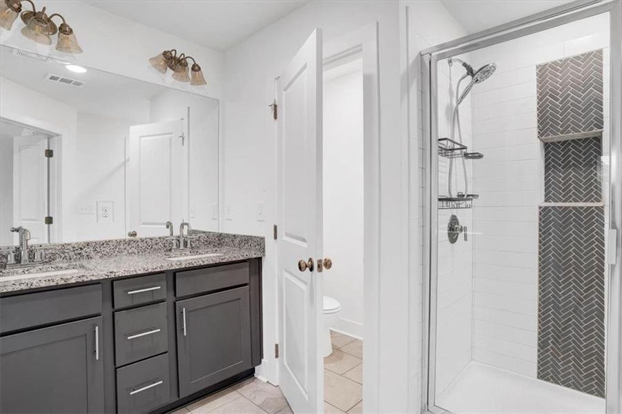 Furnished interior view inside a new home in Renaissance at South Park, Fairburn (Image 9).