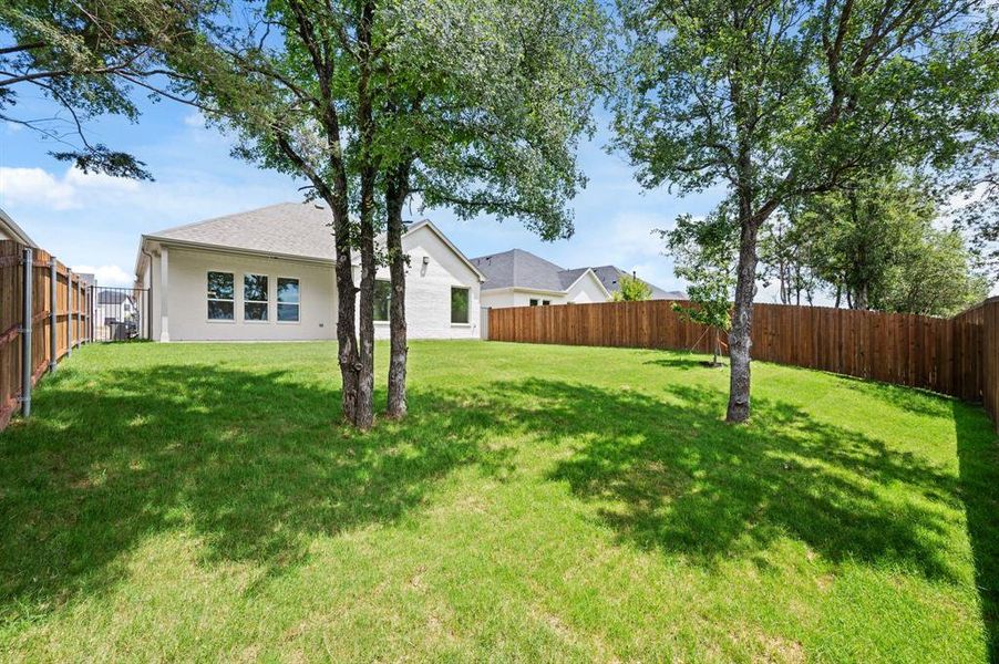 Front exterior of a new home in Parks of Aledo, Aledo, TX, highlighting curb appeal (Image 18). Front exterior of a new home in Parks of Aledo, Aledo, TX, highlighting curb appeal (Image 18).