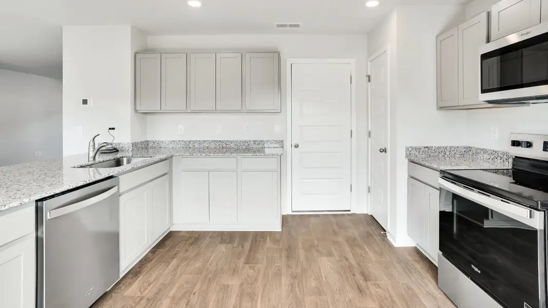 Furnished interior view inside a new home in Lockwood Landing, Supply (Image 8).