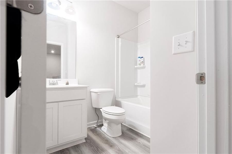 Furnished interior view inside a new home in Ellison Square, Sugar Hill (Image 11).